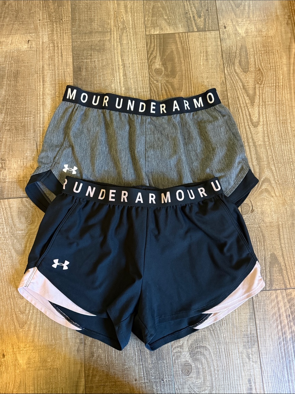 Under Armour Women’s Black and Gray Athletic Shorts with Pink Trim